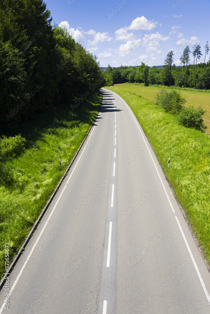 Fototapeta premium Country road from above in springtime