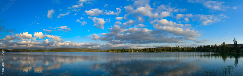 natural reflections on a lake and beautiful clouds.
