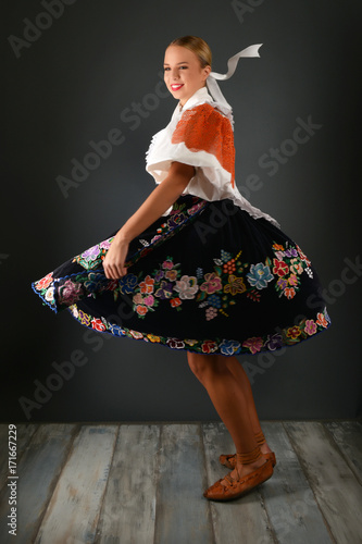 Young beautiful slovak woman in traditional costume  photo