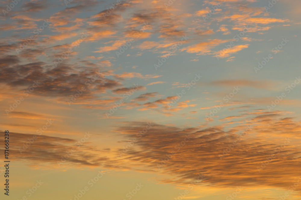 Fototapeta premium Beautiful clouds at sunrise, improbable sky