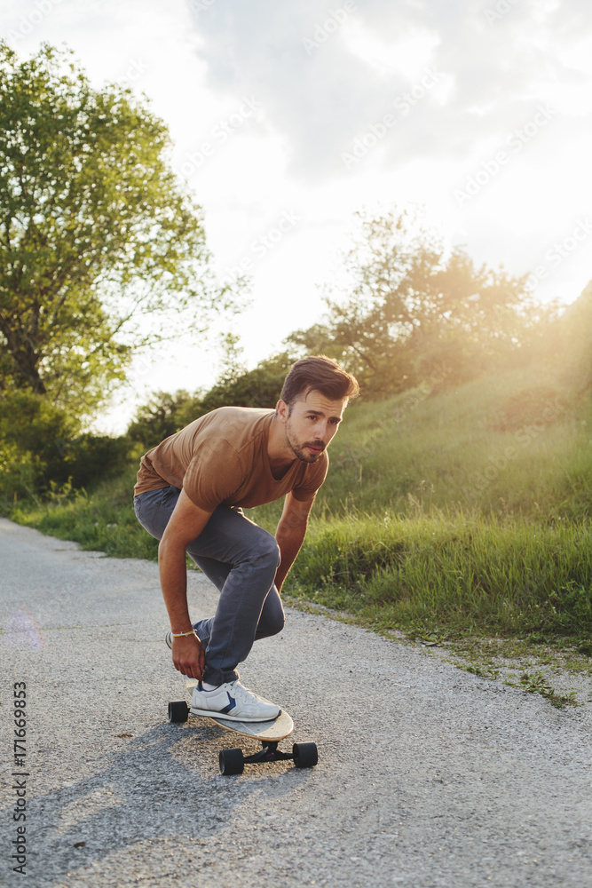 Young man longboarding Young man longboarding