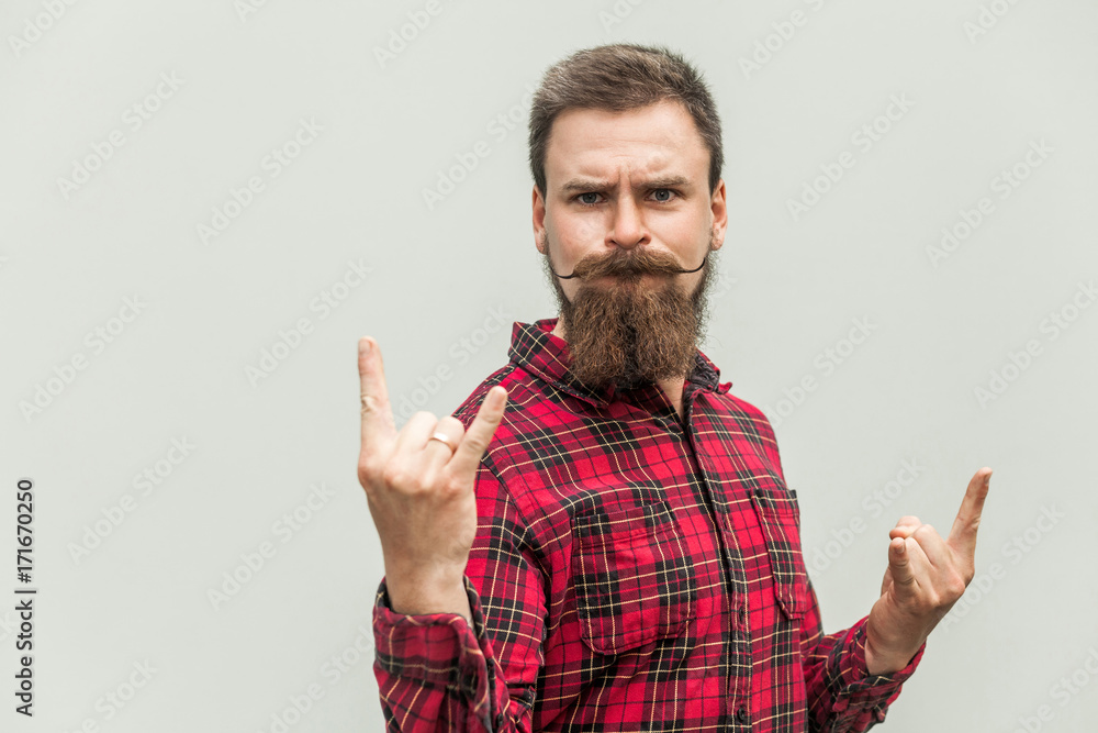 Rock n roll. Funny businessman with beard and mustache Rock n roll. Funny businessman with beard and mustache