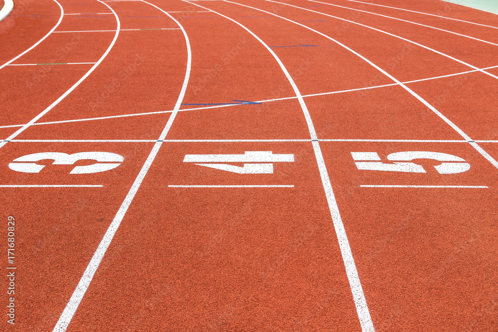 Empty athletic running track lanes texture with number in stadium