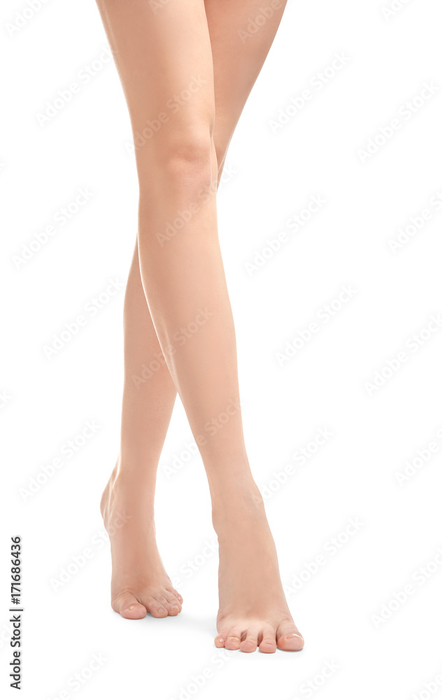 Legs of beautiful woman, isolated on white Legs of beautiful woman, isolated on white