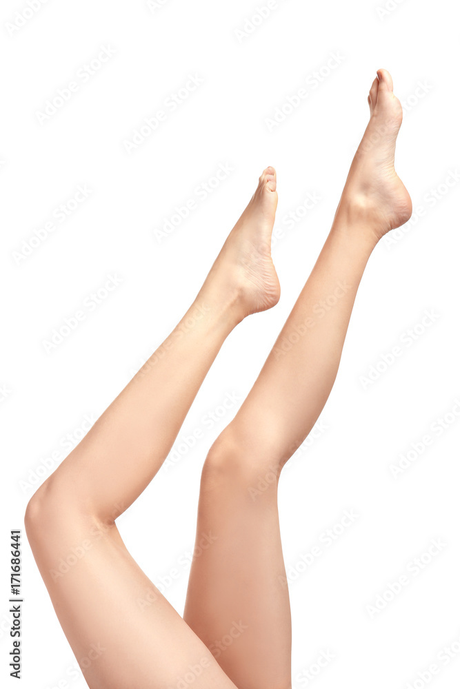 Legs of beautiful woman, isolated on white Legs of beautiful woman, isolated on white