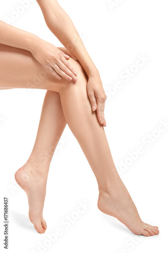 Legs of beautiful woman, isolated on white