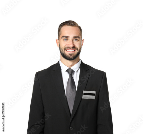 Male hotel receptionist in ...
