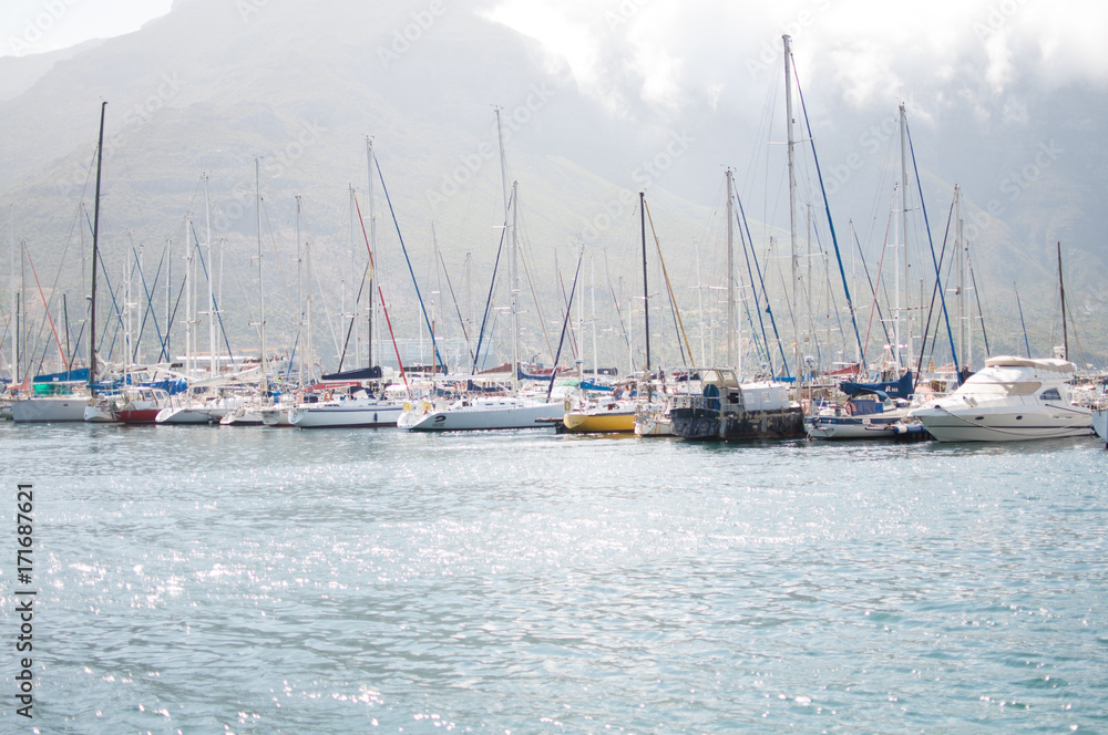 Row of sailboats in hout bay