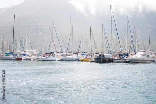 Row of sailboats in hout bay