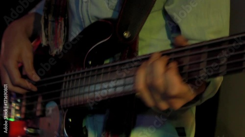 Bassist playing bass guitar