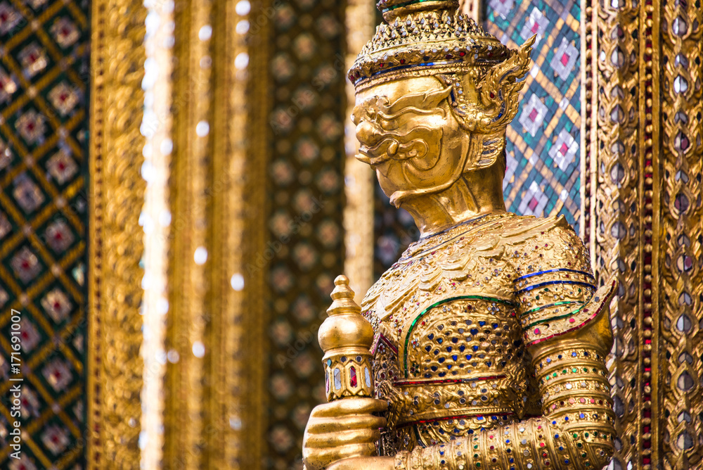 A statue of Yaksa on temple guard at the Temple of the Emerald Buddha, Bangkok, Thailand