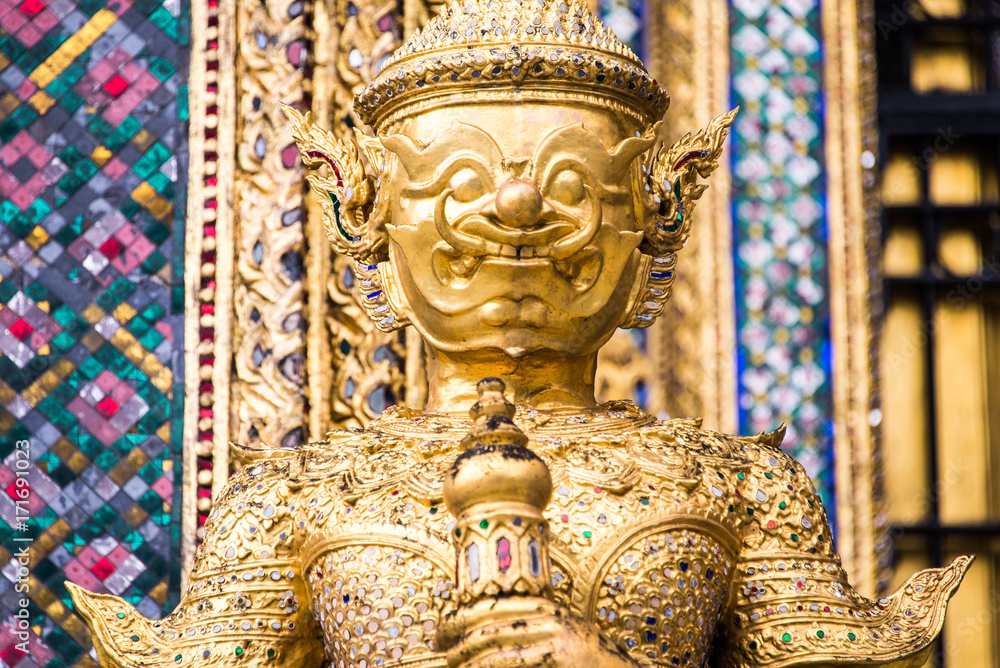 A statue of Yaksa on temple guard at the Temple of the Emerald Buddha, Bangkok, Thailand