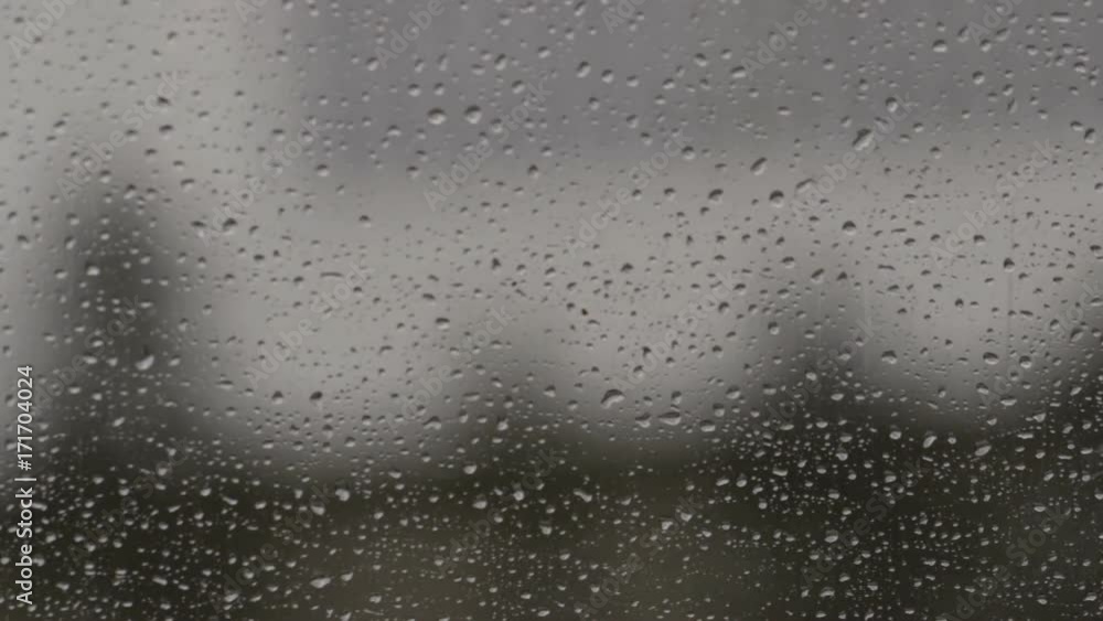 Rain drops on the glass in the car Rain drops on the glass in the car