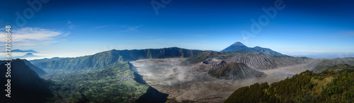 Mount Bromo volcano (Gunung Bromo) on blue sky background in Bromo Tengger Semeru National Park, East Java, Indonesia.