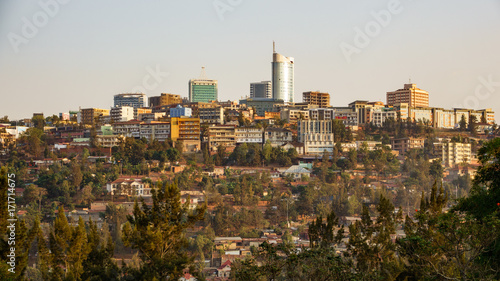 Fotografie Kigali downtown with modern buildings and huts