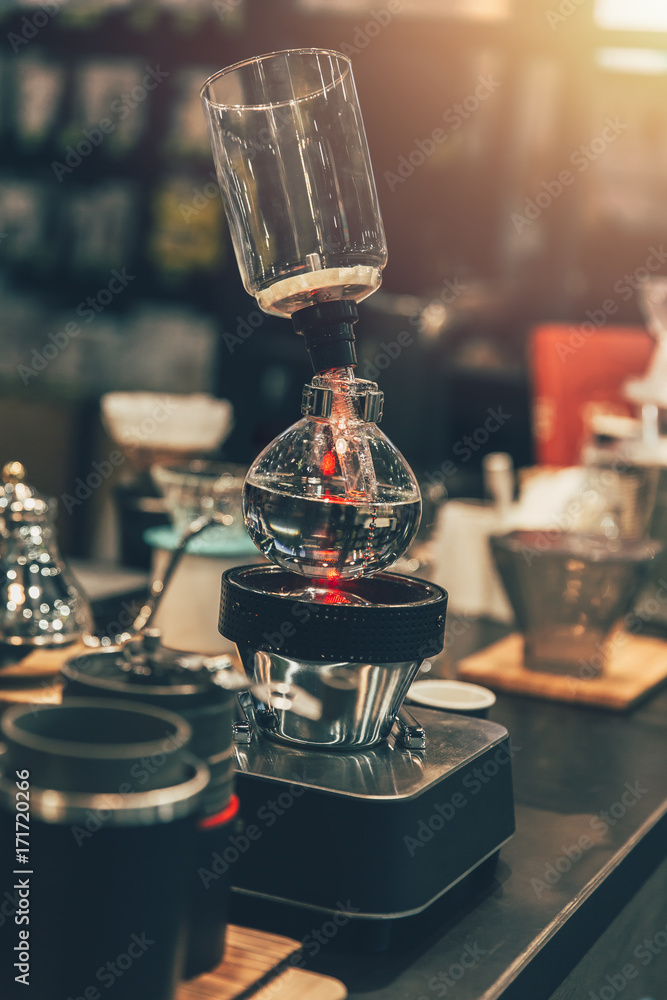 Syphon Coffee Maker Cafe in coffee shop vintage color