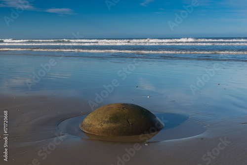 Famous Moeraki Boulders at sunrise, Koekohe beach,Otago, South Island, New Zealand photo