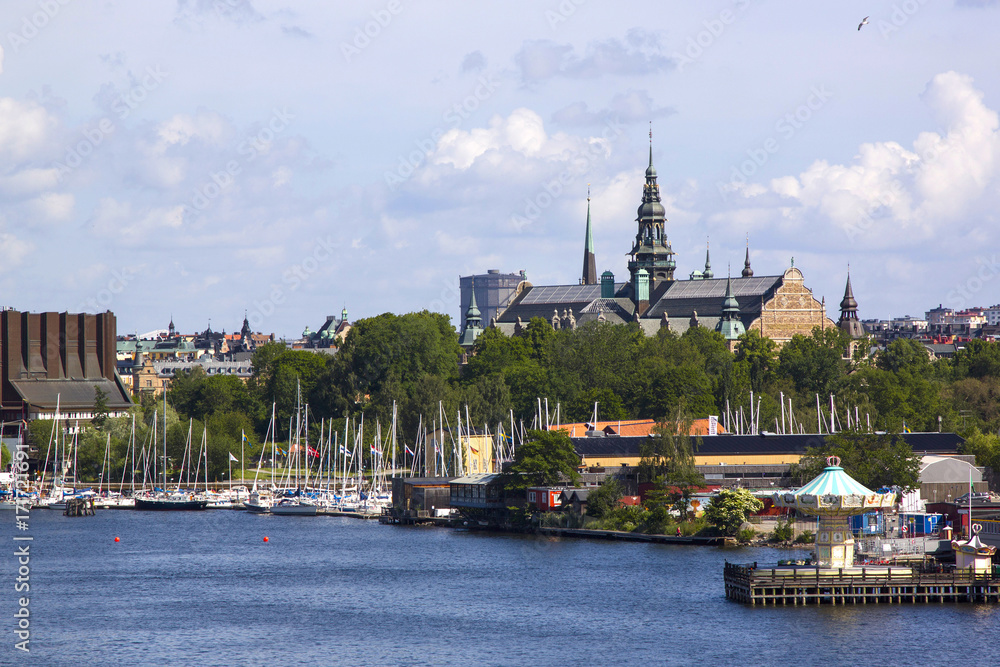 Obraz premium Scenic summer panorama of the Old Town (Gamla Stan) pier architecture in Stockholm, Sweden