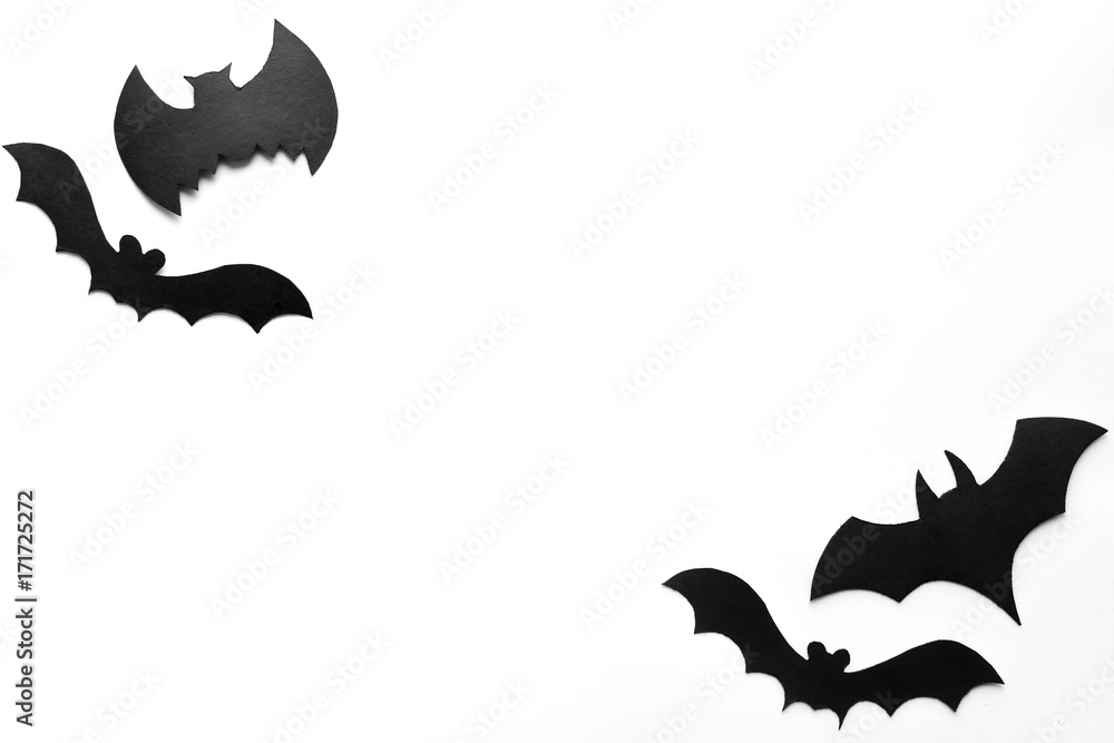 Fototapeta premium Halloween background, black bats on white background,hand made fall decor.