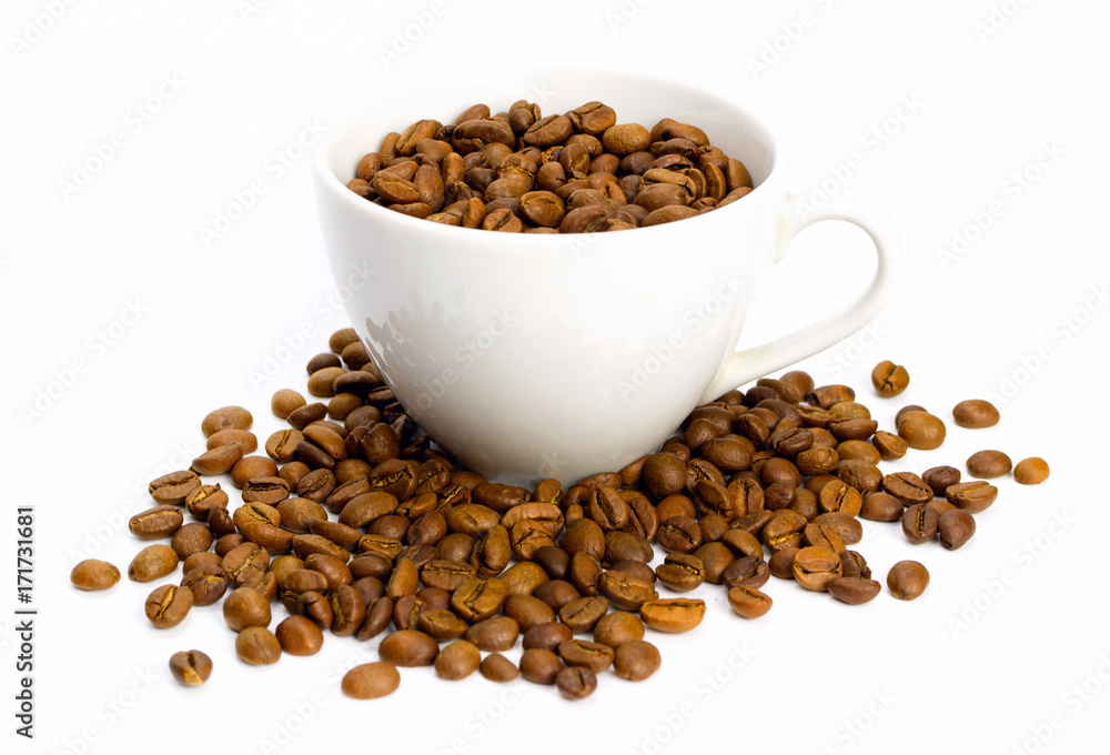 White cup full of coffee beans on white background. Selective focus, isolated White cup full of coffee beans on white background. Selective focus, isolated