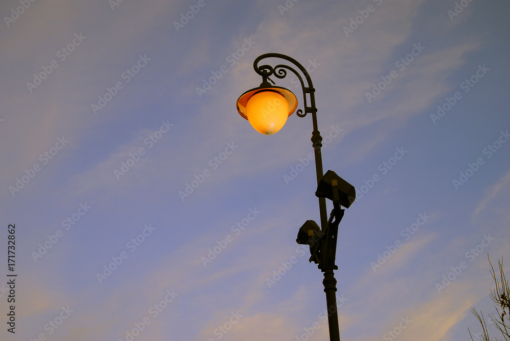 Vintage style street lamp in Moscow Kremlin. Color evening photo.