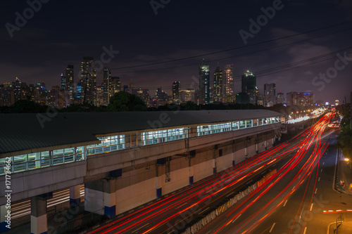 Night landscape of EDSA road and Makati at background