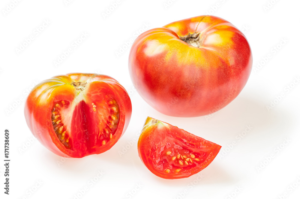 Big fresh whole tomato and tomato with cut piece. Isolated on white Big fresh whole tomato and tomato with cut piece. Isolated on white