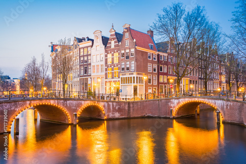 Twilight in Amsterdam city with dutch old buildings, Netherlands