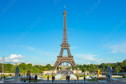 Eiffel Tower seen from Jardins du Trocadero at a sunny summer day in Paris, France © orpheus26