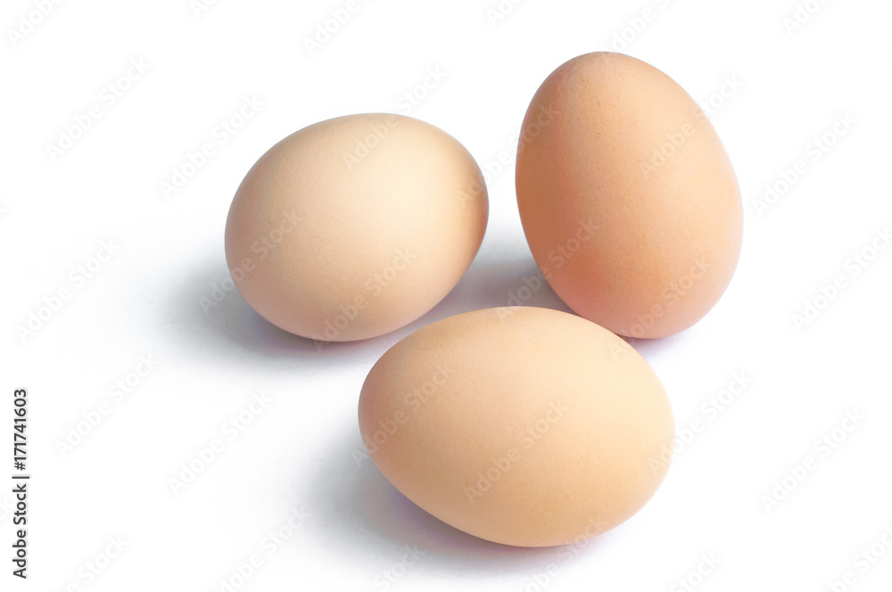 Three fresh brown hen eggs, isolated on white background Three fresh brown hen eggs, isolated on white background