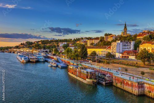 Sunset over Belgrade and ships in the harbor. HDR image