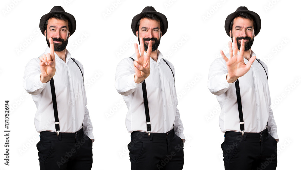 Hipster man with beard counting one, three and five Hipster man with beard counting one, three and five
