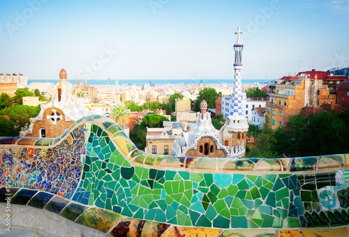Gaudi bench and cityscape of Barcelona from park Guell, famous view of Barcelona, Spain, toned