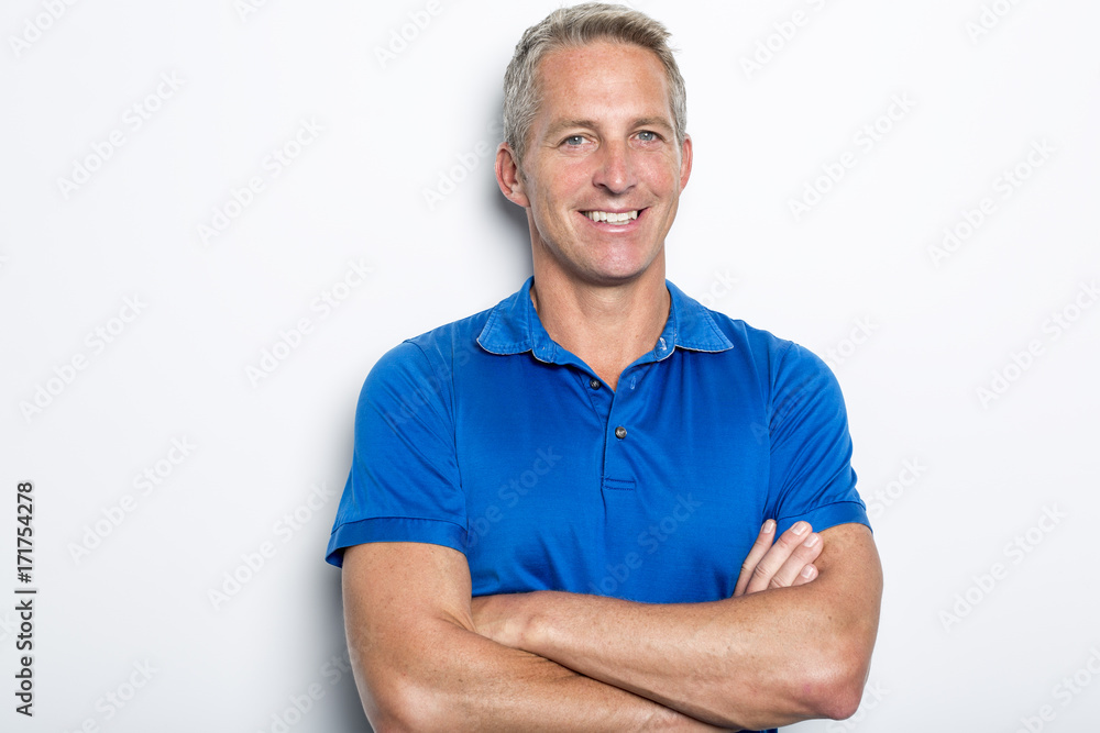 Portrait of confident mature man standing on white background Portrait of confident mature man standing on white background