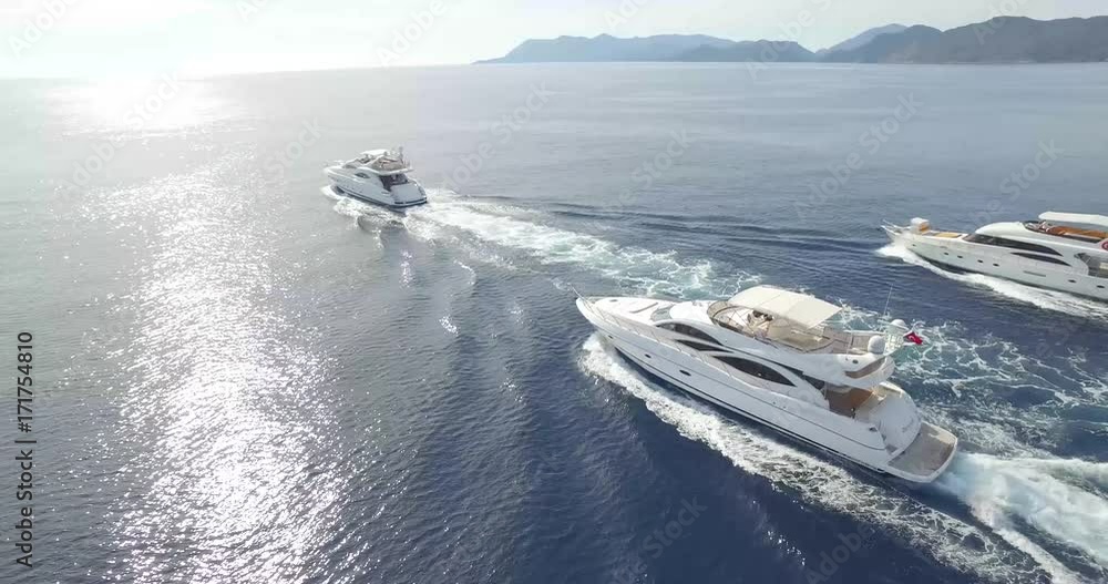 Luxury private motor yacht sailing at sea