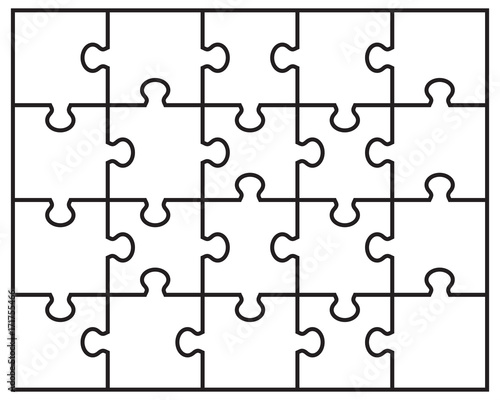 Separate pieces of white jigsaw puzzle