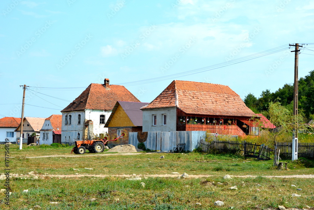 Typical rural landscape and peasant houses in the village Mercheasa ...