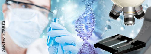Photo scientist, DNA helix and microscope in blue background