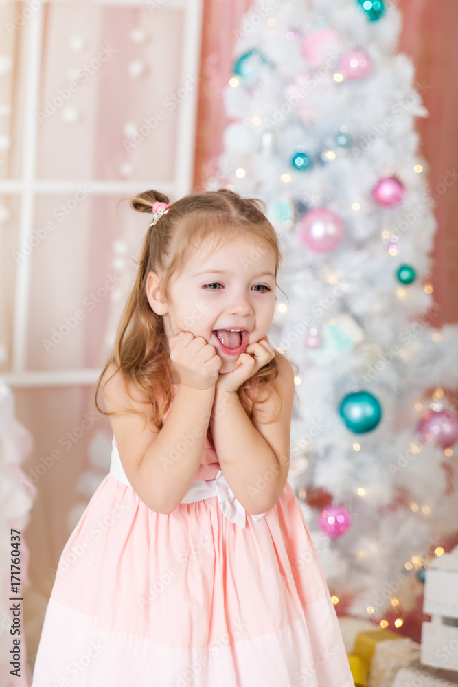 Cute girl in a Christmas decorations