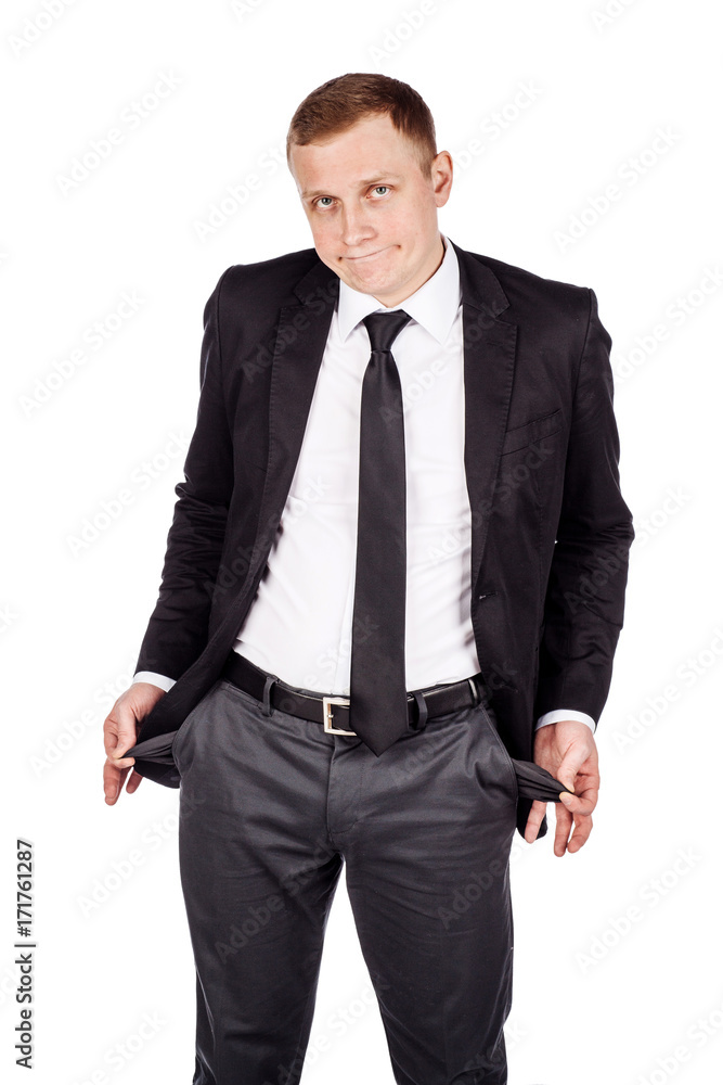 businessman showing his empty pockets isolated on white background businessman showing his empty pockets isolated on white background