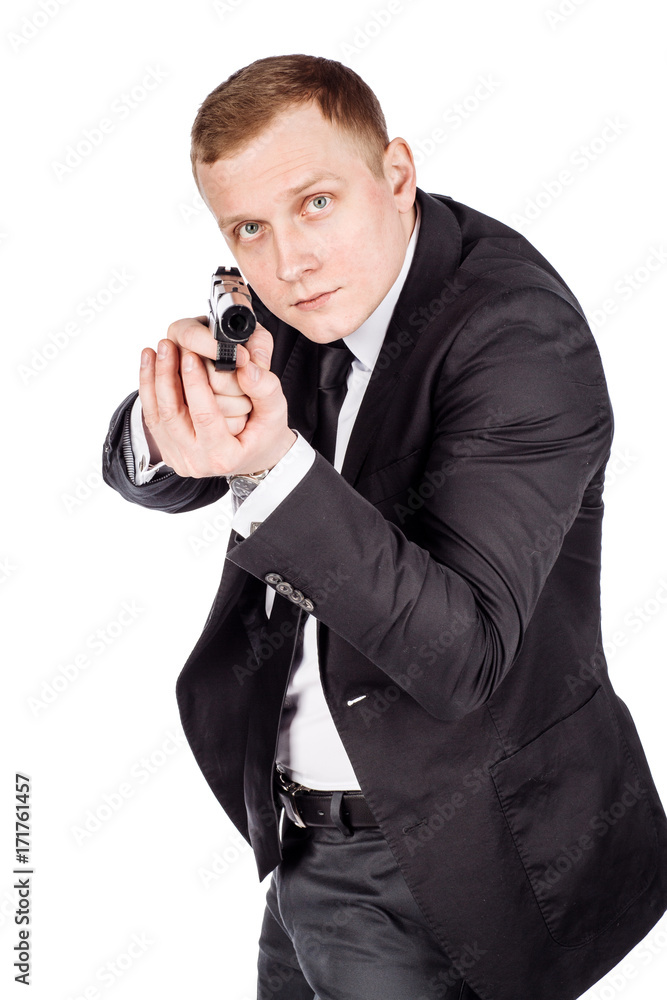 aghent or spy holds pistol with silincer in hand. Isolated on white background. aghent or spy holds pistol with silincer in hand. Isolated on white background.