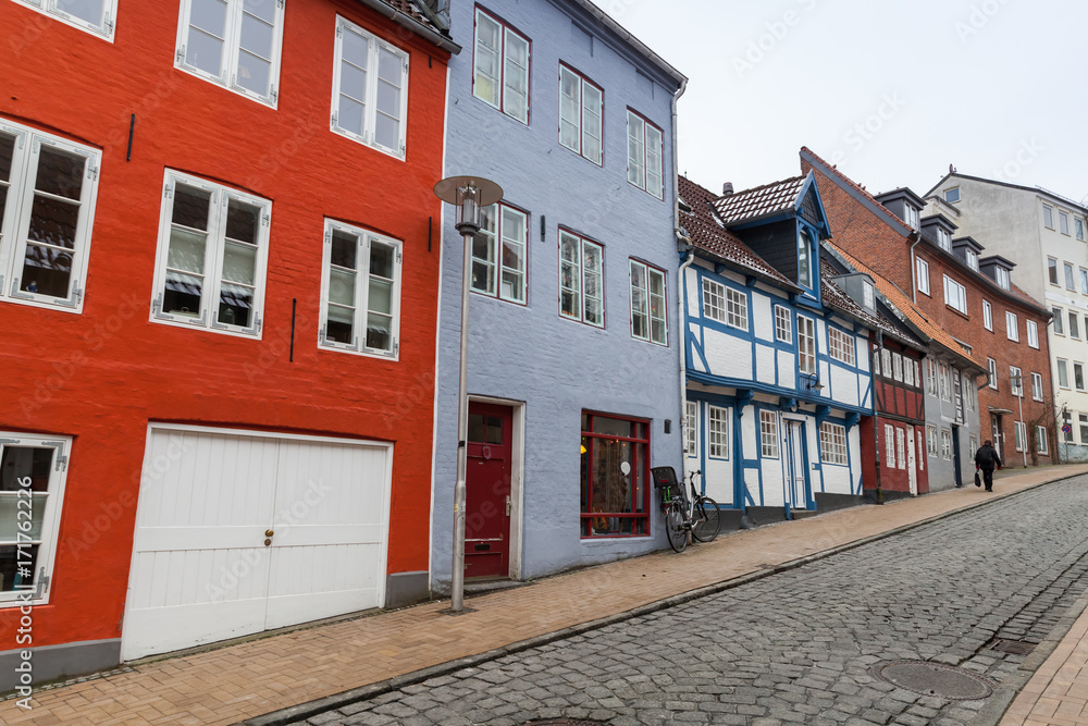 Street view with traditional colorful living houses Street view with traditional colorful living houses