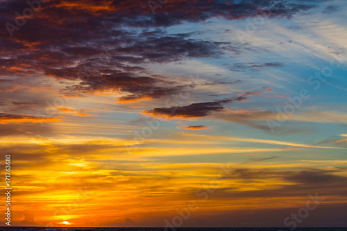 Cloudy sky over the sea at sunset © Gabriele Maltinti