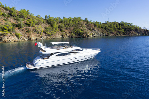 Luxury private motor yacht sailing at sea © murattellioglu