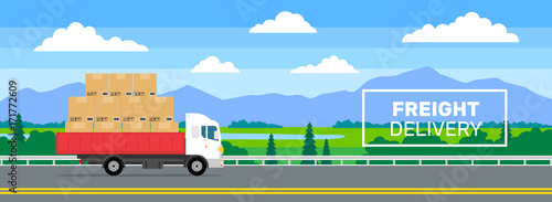 freight delivery truck with cardboard boxes on the road banner design