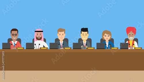 politicians of different nationalities sitting at the table on conference meeting