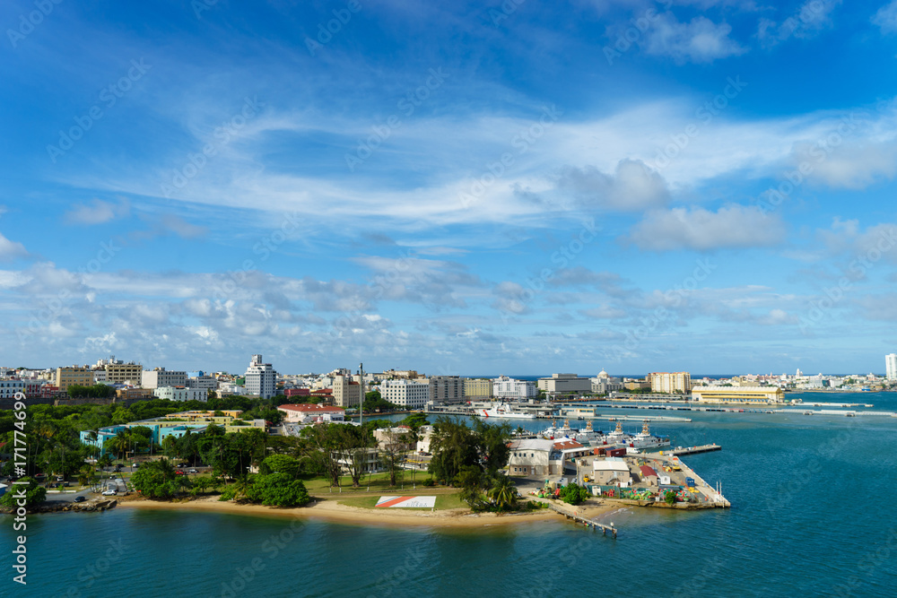 Scenic view of historic colorful Puerto Rico city in distance from the sea