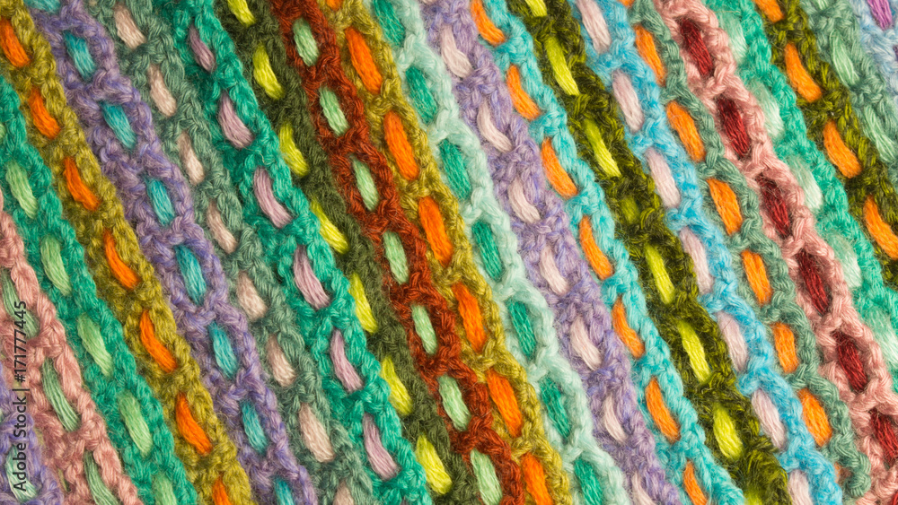 Handmade wool knitted colorful texture background