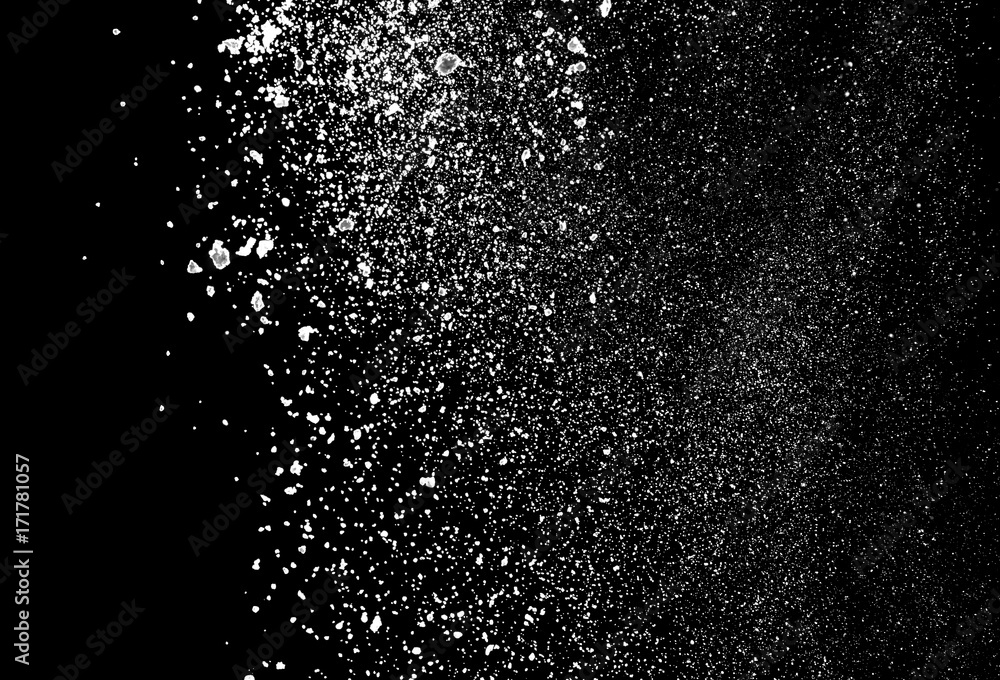 Obraz premium white powder explosion isolated on black background for graphic resources