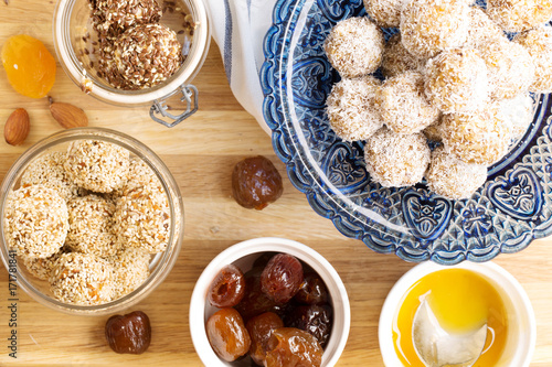 Candy with dates, dried apricots and nuts, horizontal, selective focus, top view, ingredients